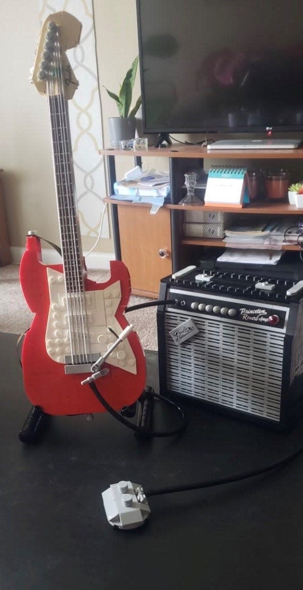 A guitar and amplifier Lego set built by Shatoria Lunsford is pictured inside her apartment.