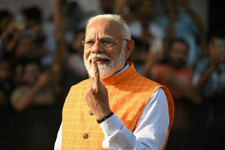 Narendra Modi is consistently ranked among the world's most popular leaders (Sajjad HUSSAIN)