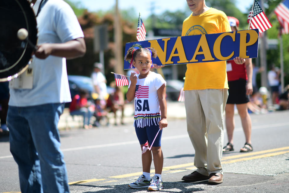 A girl participates in a Fourth of July parade in Pottstown, Pa., in 2021.