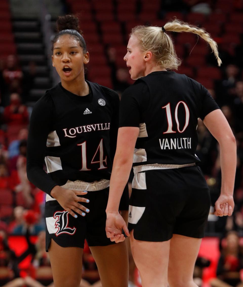 Louisville’s Hailey Van Lith celebrates Kianna Smith’s bucket against Michigan,Dec. 2, 2021