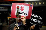 Women attend a protest as a part of the #MeToo movement on International Women's Day in Seoul, South Korea, March 8, 2018. REUTERS/Kim Hong-Ji