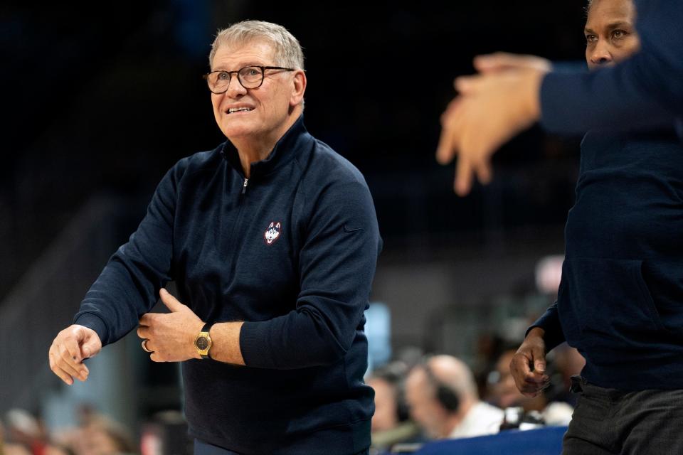 UConn head coach Geno Auriemma looks at the clock during the second half of an NCAA college basketball game Saturday, Feb. 25, 2023, in Chicago. (AP Photo/Erin Hooley)