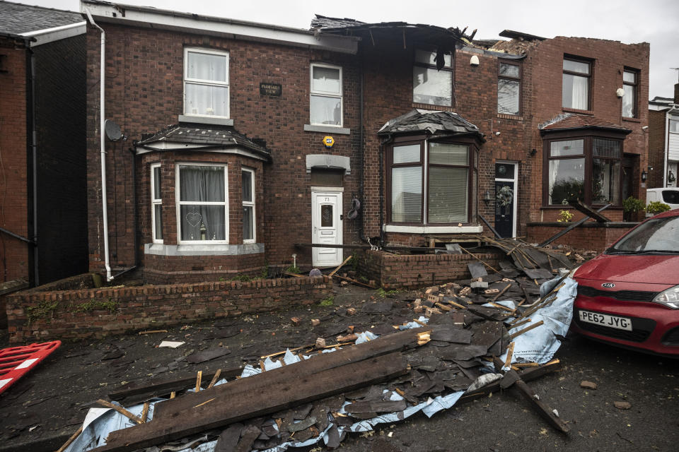 STALYBRIDGE, ENGLAND - DECEMBER 28: Roofs can be seen ripped off homes on Hough Hill Road following a tornado on December 28, 2023 in Stalybridge, England. Houses in the Tameside area of Greater Manchester have been damaged by a localised tornado during Storm Gerrit. Police declared a major incident last night as roofs were torn off the houses and trees uprooted, but no reported injuries. (Photo by Ryan Jenkinson/Getty Images)