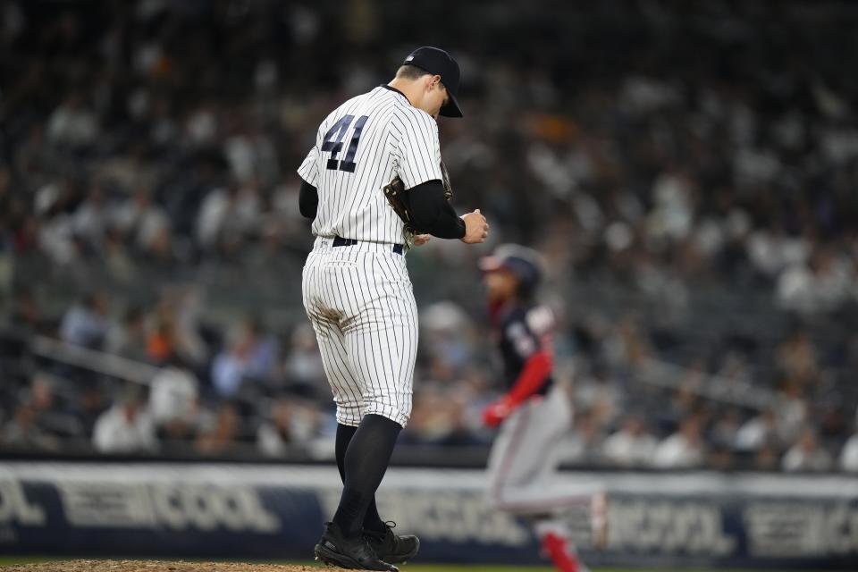 New York Yankees relief pitcher Tommy Kahnle (41) waits as Washington Nationals' CJ Abrams runs the bases on a home run during the eighth inning of a baseball game Tuesday, Aug. 22, 2023, in New York. (AP Photo/Frank Franklin II)