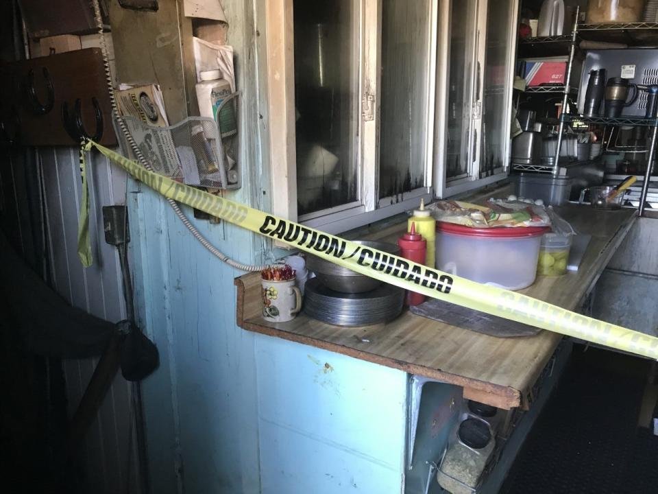 Caution tape blocks off basement stairs from the kitchen inside the Mason Depot Diner July 11, 2019. The former railroad depot, built in 1902, was heavily damaged by the fire.