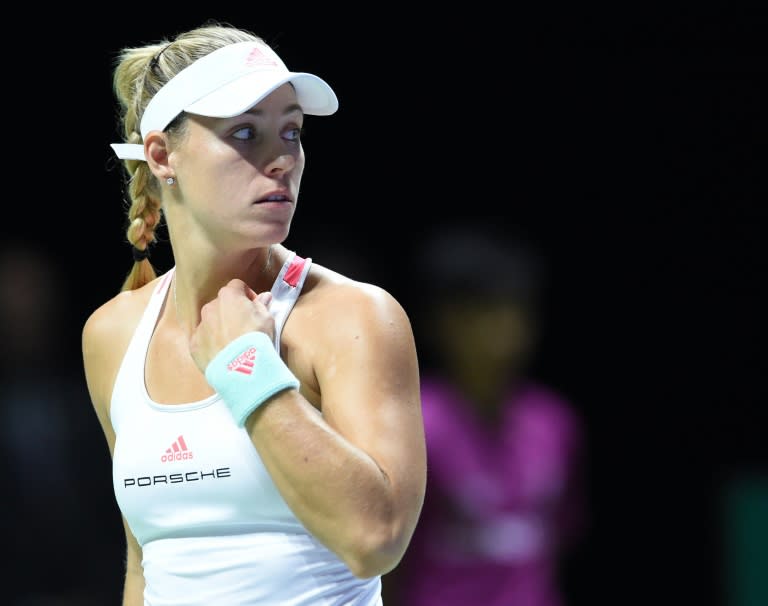 Germany's Angelique Kerber beat rising US star Madison Keys 6-3 6-3 to charge into the WTA semi-finals in Singapore