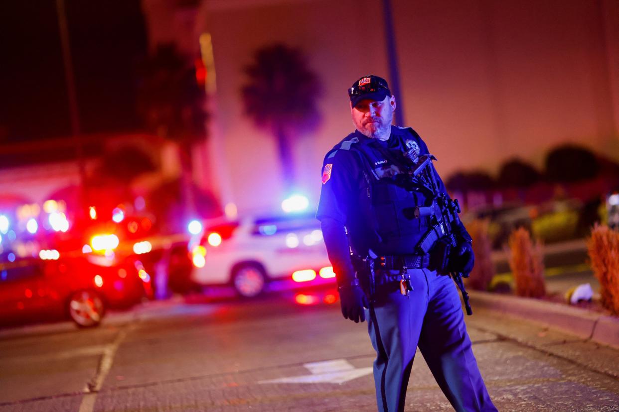 A law enforcement member looks on outside the Cielo Vista Mall after a shooting, in El Paso, Texas, U.S February 15, 2023 (REUTERS)