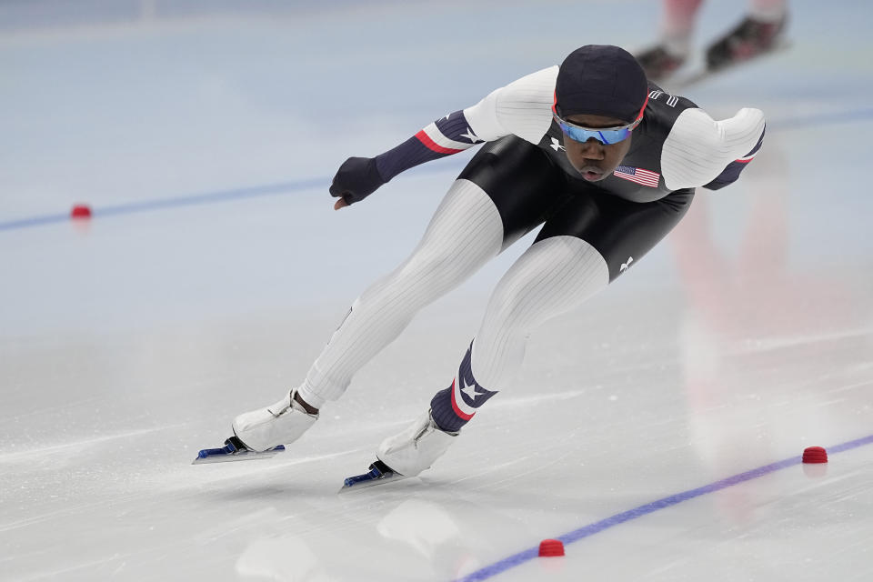 Erin Jackson of the United States competes in the speedskating women's 500-meter race at the 2022 Winter Olympics, Sunday, Feb. 13, 2022, in Beijing. (AP Photo/Sue Ogrocki)