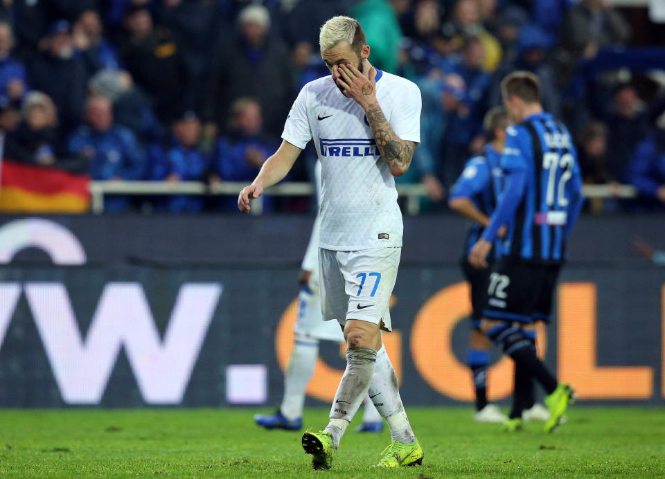 Inter's Marcelo Brozovic walks off the pitch after getting a red card during the Serie A soccer match between Atalanta and Inter Milan, in Bergamo, Italy, Sunday, Nov. 11, 2018. (Paolo Magni/ANSA via AP)