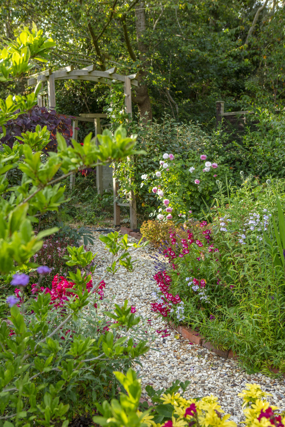 4. Edge your garden pathways with brick