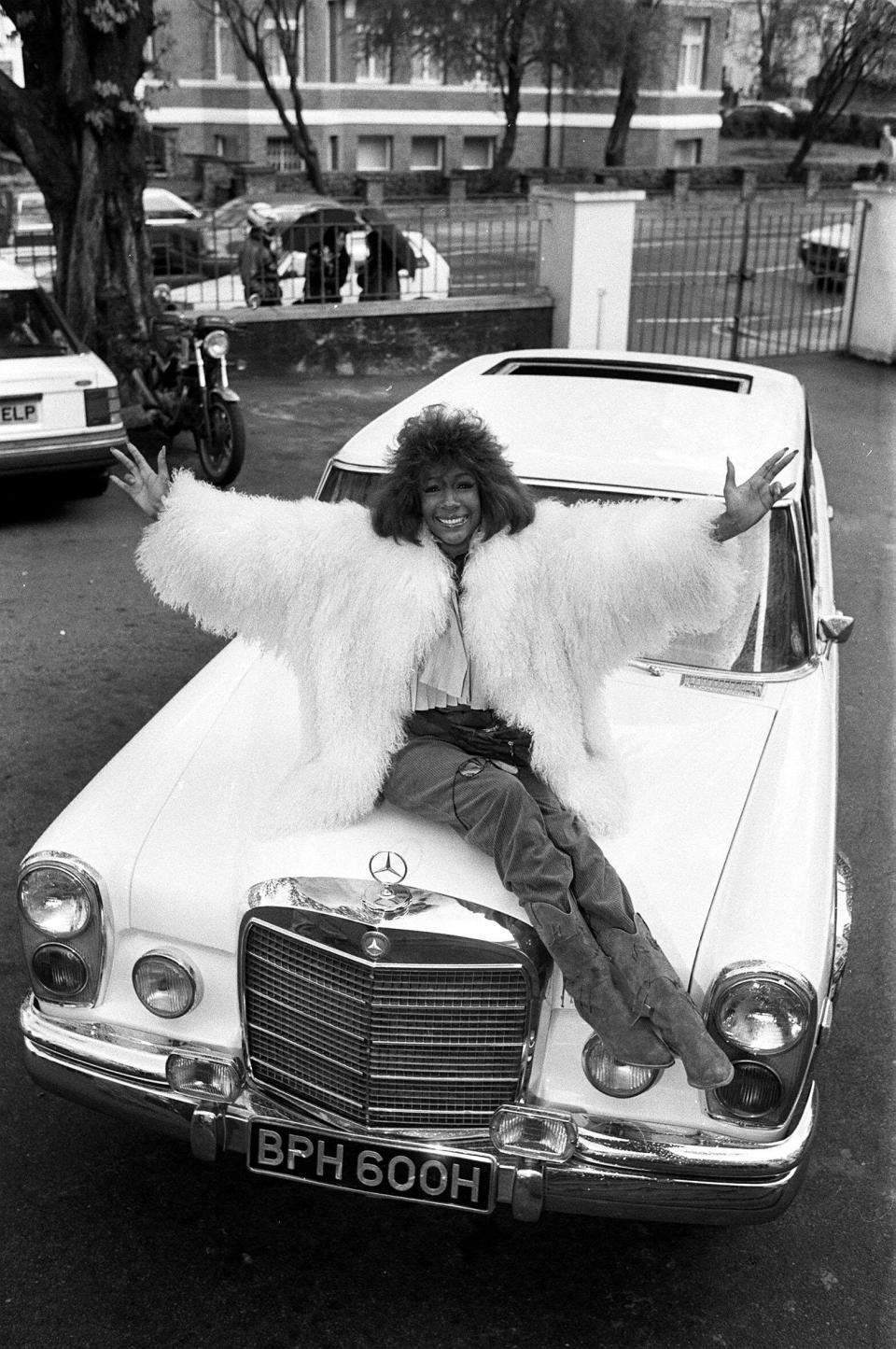 Mary Wilson with the Mercedes-Benz 600 Pullman Limousine custom-built for John Lennon in 1970.