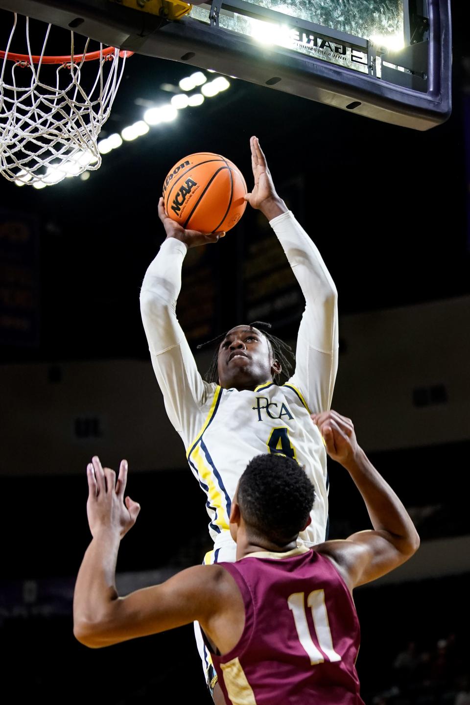 Providence Christian forward Aiden Bolden (4) shoots over ECS forward Connor Ross, Jr. (11) during the third quarter of a Division II A Semifinal game at the Eblen Center in Cookeville, Tenn., Friday, March 1, 2024.