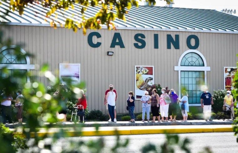 A line of people line up outside Vernon Downs in this file photo.