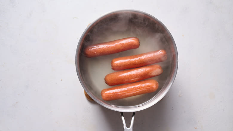 boiling hot dogs in pot