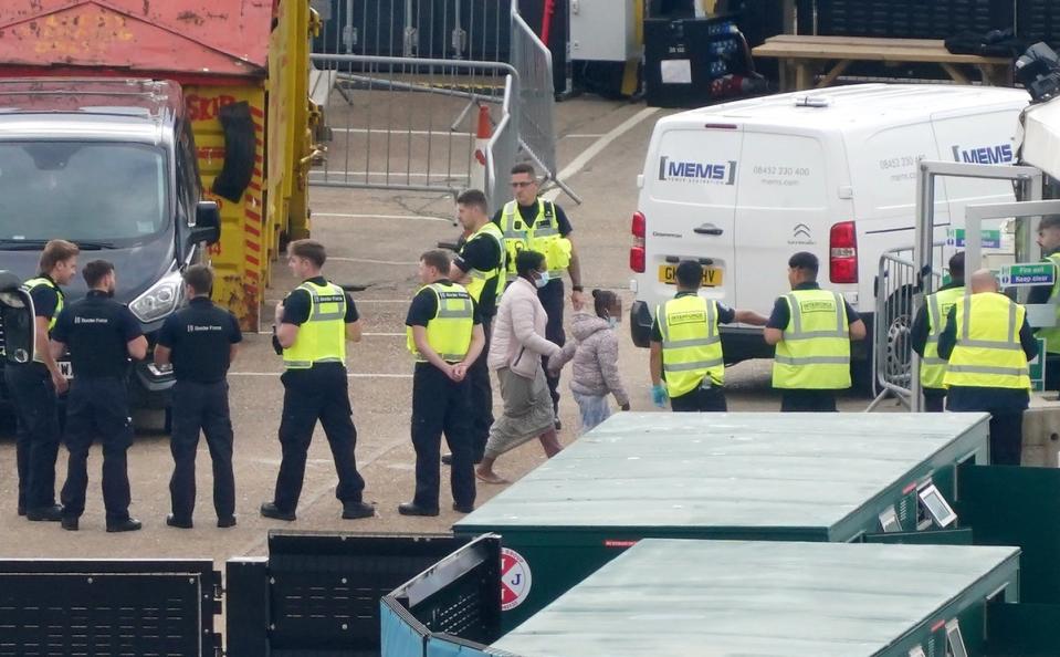 Migrants being processed after arriving in Dover on Tuesday morning  (PA)