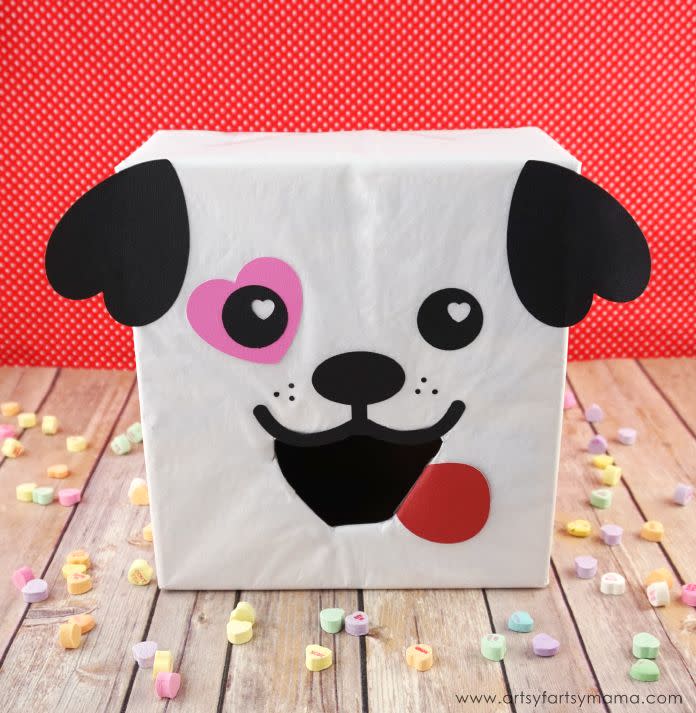 <p>If your little one loves dogs, this puppy box is the one to make! Who can resist the heart-shaped puppy ears?</p><p><strong>Get the tutorial at</strong> <a href="https://www.artsyfartsymama.com/2017/02/puppy-dog-valentine-card-box.html" rel="nofollow noopener" target="_blank" data-ylk="slk:Artsy Fartsy Mama." class="link "><strong>Artsy Fartsy Mama.</strong></a></p><p><a class="link " href="https://www.amazon.com/Neenah-Creative-Collection-Specialty-Cardstock/dp/B003A2I4V2/?tag=syn-yahoo-20&ascsubtag=%5Bartid%7C2164.g.35119968%5Bsrc%7Cyahoo-us" rel="nofollow noopener" target="_blank" data-ylk="slk:Shop Now">Shop Now</a></p>