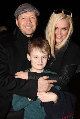 Bruce Glikas/FilmMagic Donnie Walhberg, Jenny McCarthy and Evan Asher in 2014.