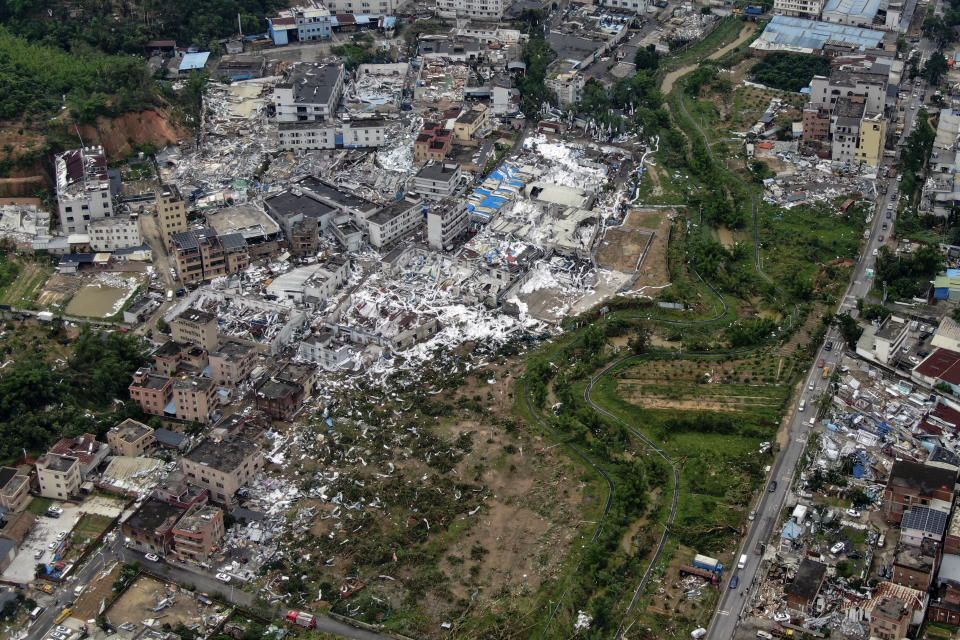 In this photo provided by China's Xinhua News Agency, an aerial view shows damaged buildings in the aftermath of a tornado in Guangming Village of Zhongluotan Town, Baiyun District, Guangzhou, south China's Guangdong Province, Sunday, April 28, 2024. Aerial photos posted by Chinese state media on Sunday showed the wide devastation of a part of the southern city of Guangzhou after a tornado swept through the day before, killing and injuring dozens of people and damaging over a hundred buildings. (Deng Hua/Xinhua via AP)