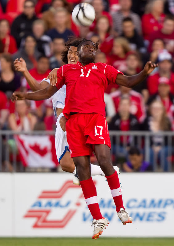 Olivier Occean of Canada and Roger Espinoza of Honduras jump for a header during their FIFA 2014 World Cup Qualifier at BMO field in Toronto, Ontario, June 12, 2012. The match ended in a 0-0 tie. AFP PHOTO / Geoff RobinsGEOFF ROBINS/AFP/GettyImages