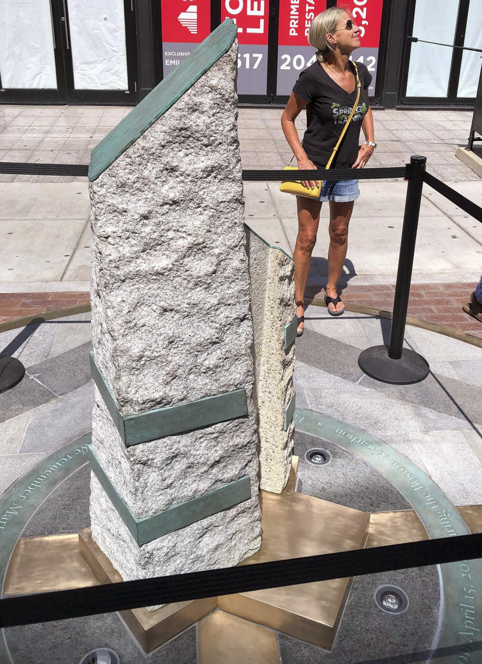 Two of the stone pillars stand along Boylston Street after installation was finished, Monday, Aug. 19, 2019, in Boston to memorialize the Boston Marathon bombing victims at the sites where they were killed. Martin Richard, Krystle Campbell and Lingzi Lu were killed when bombs were detonated at two locations near the finish line on April 15, 2013. (AP Photo/Philip Marcelo)