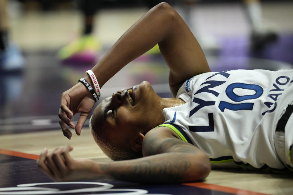 UNCASVILLE, CONNECTICUT - OCTOBER 6: Courtney Williams #10 of the Minnesota Lynx reacts during the first half of Game Four of the WNBA playoff semifinals against the Connecticut Sun at Mohegan Sun Arena on October 6, 2024 in Uncasville, Connecticut. NOTE TO USER: User expressly acknowledges and agrees that, by downloading and or using this photograph, User is consenting to the terms and conditions of the Getty Images License Agreement. (Photo by Joe Buglewicz/Getty Images)