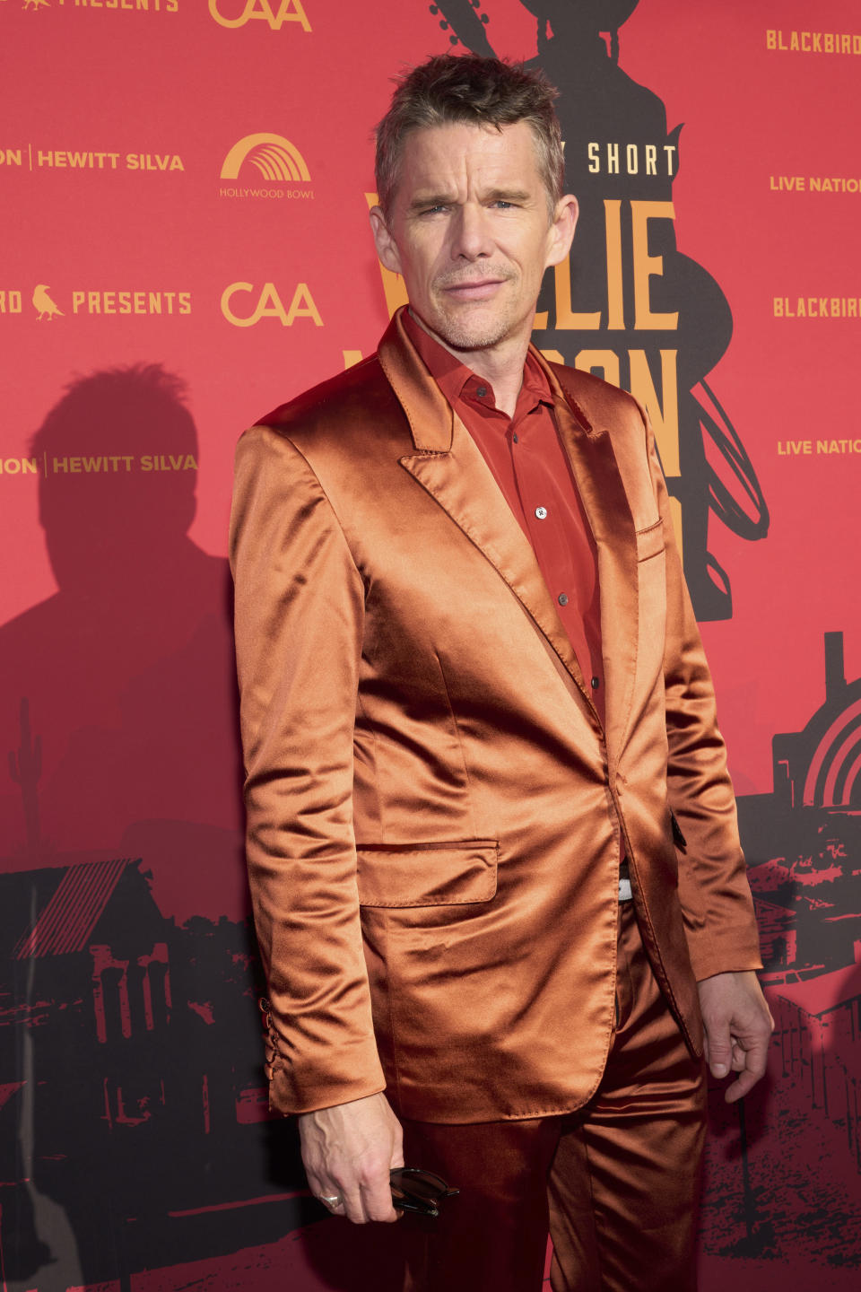 Ethan Hawke arrives at Willie Nelson 90, celebrating the singer's 90th birthday on Saturday, April 29, 2023, at the Hollywood Bowl in Los Angeles. (Photo by Allison Dinner/Invision/AP)