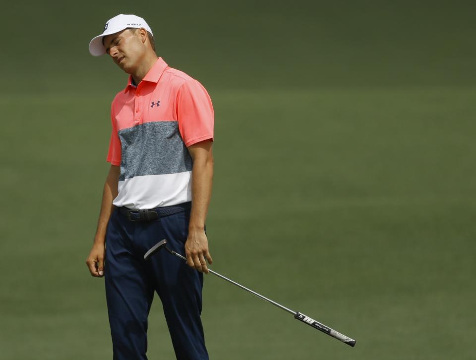 Jordan Spieth reacts after a missed putt on the second hole during the second round for the Masters golf tournament Friday, April 12, 2019, in Augusta, Ga. (AP Photo/Matt Slocum)