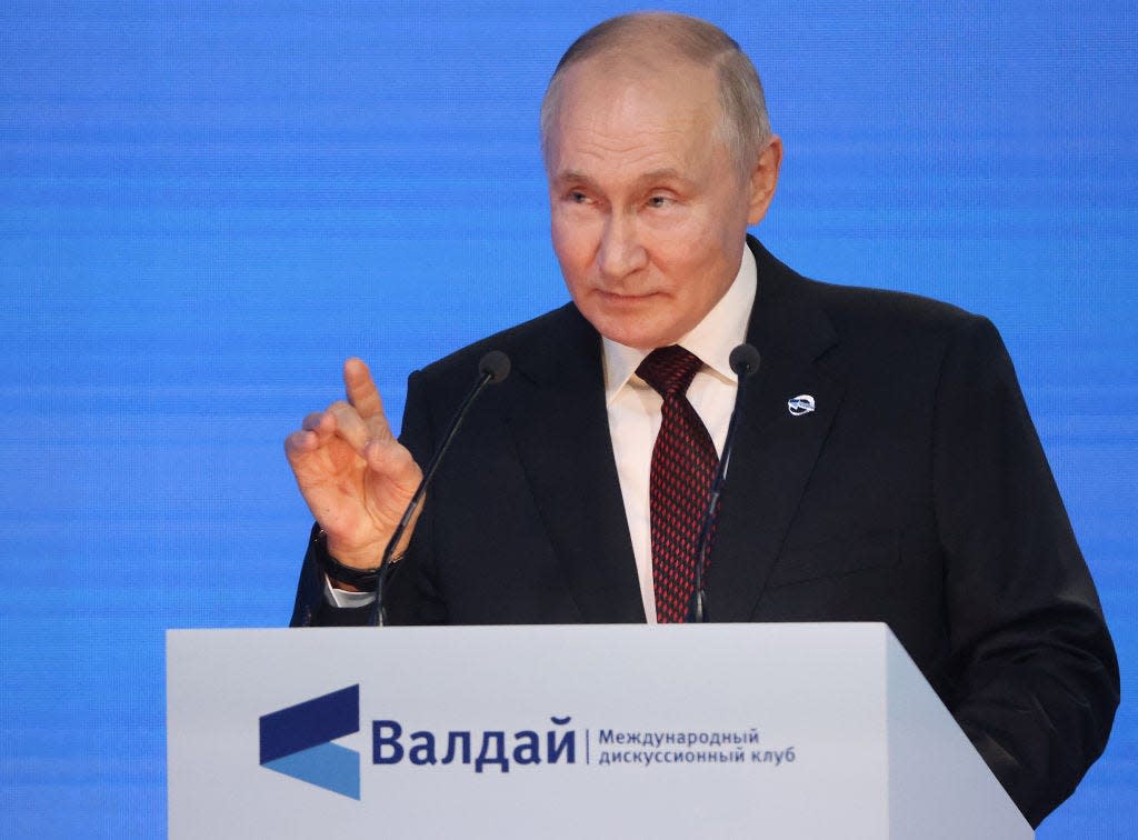 Russian President Vladimir Putin gestures during his annual meeting with participants of the Valdai Discussion Club on October 5, 2023 in Sochi, Russia. President Putin is having a two-day visit to Russia's Black Sea resort of Sochi to meet foreign and local political experts.