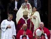 FILE - In this Oct. 6, 2019, file photo, Washington D.C. Archbishop Wilton Gregory, accompanied by other members of the clergy, leaves St. Mathews Cathedral after the annual Red Mass in Washington. Pope Francis on Sunday, Oct. 25, 2020, named 13 new cardinals, including Washington D.C. Archbishop Wilton Gregory, who would become the first Black U.S. prelate to earn the coveted red hat. In a surprise announcement from his studio window to faithful standing below in St. Peter’s Square, Francis said the churchmen would be elevated to a cardinal’s rank in a ceremony on Nov. 28. (AP Photo/Jose Luis Magana, File)