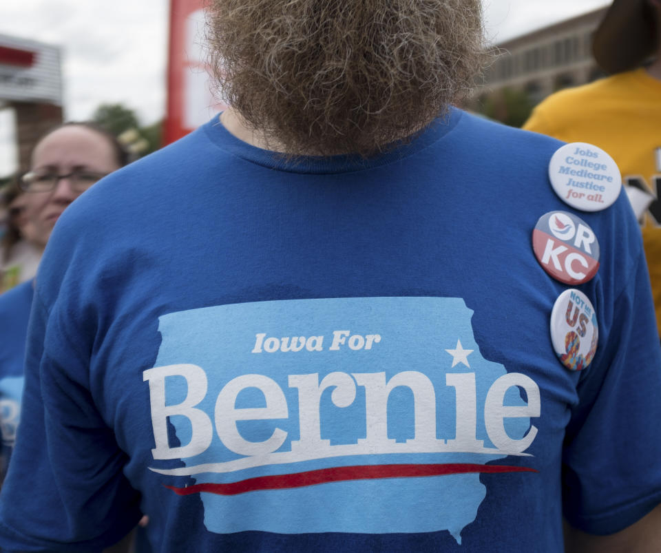 A Bernie Sanders supporter listens as the Vermont senator speaks at the Iowa State Fair on Aug. 11, 2019. (Photo: Seth Herald for HuffPost)