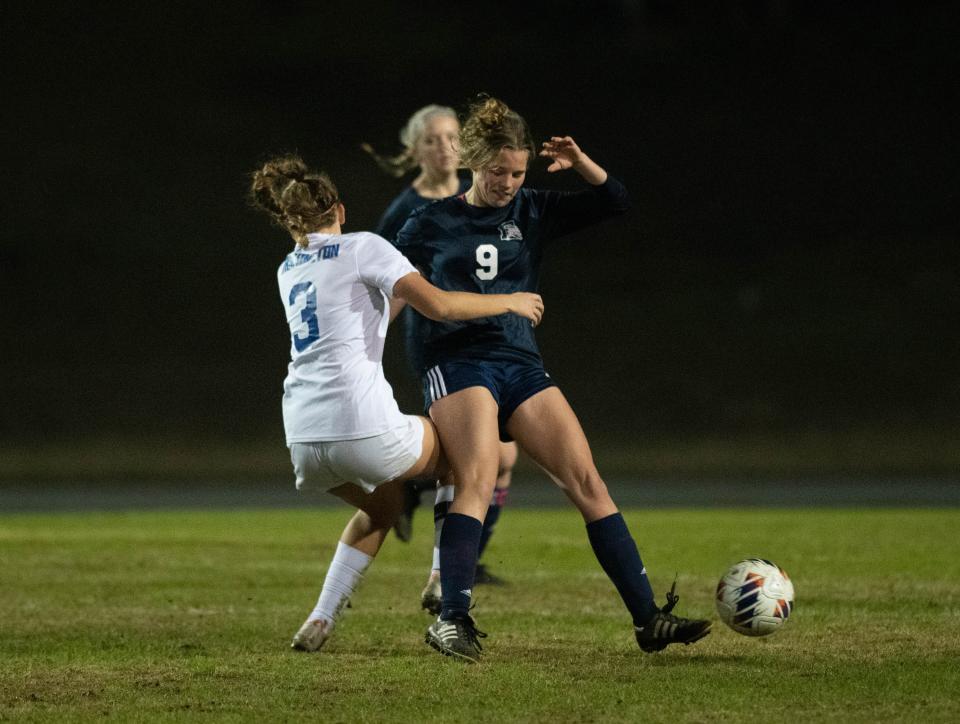 Kaylah Carpenter (3) and Amelia  Hastings (9) collidge while fighting for the ball during the Booker T. Washington vs Escambia girls soccer game at Escambia High School in Pensacola on Friday, Jan. 6, 2023.