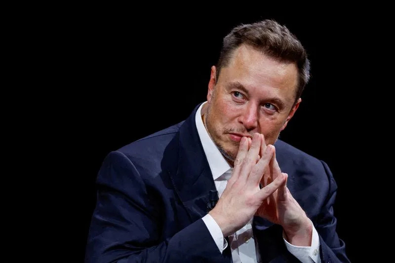 FILE PHOTO: FILE PHOTO: Tesla CEO and Twitter owner Elon Musk attends the VivaTech conference in Paris