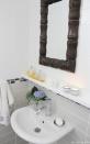 <p>No vanity, no problem! Just add one of <a rel="nofollow noopener" href="http://www.housebeautiful.com/lifestyle/organizing-tips/g2784/ikea-bathroom-hacks/?slide=1" target="_blank" data-ylk="slk:IKEA's floating picture ledges;elm:context_link;itc:0;sec:content-canvas" class="link ">IKEA's floating picture ledges</a> under the mirror and above the sink for a handy spot to keep your perfume collection and cotton swabs.</p><p><em><a rel="nofollow noopener" href="http://www.yasamstil.com/2013/06/banyo-ilham/" target="_blank" data-ylk="slk:See more at Yasam Stil »;elm:context_link;itc:0;sec:content-canvas" class="link ">See more at Yasam Stil »</a></em></p>