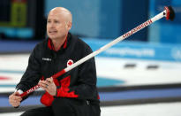 Curling - Pyeongchang 2018 Winter Olympics - Men's Semi-final - Canada v U.S. - Gangneung Curling Center - Gangneung, South Korea - February 22, 2018 - Skip Kevin Koe of Canada watches the shot. REUTERS/Phil Noble