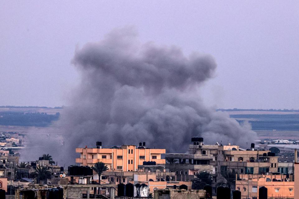 Smoke billows following Israeli airstrikes on Rafah in the southern Gaza Strip on Nov. 18, 2023, amid the continuing battles between Israel and the militant group Hamas.
