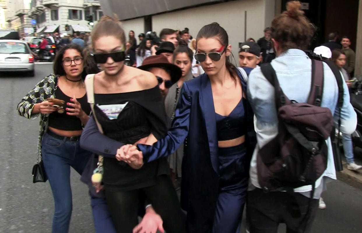 Bella and Gigi Hadid leave the Max Mara event. (Photo: X17online.com)