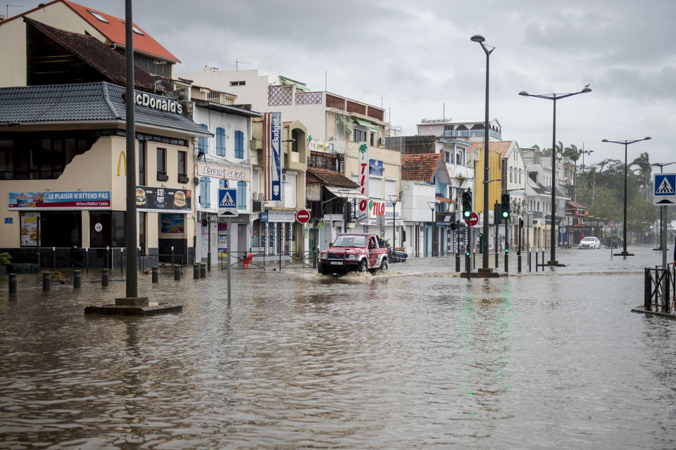 A motorist drives along&nbsp;the flooded waterfront in Fort-de-France, Martinique, on Sept. 19, 2017.