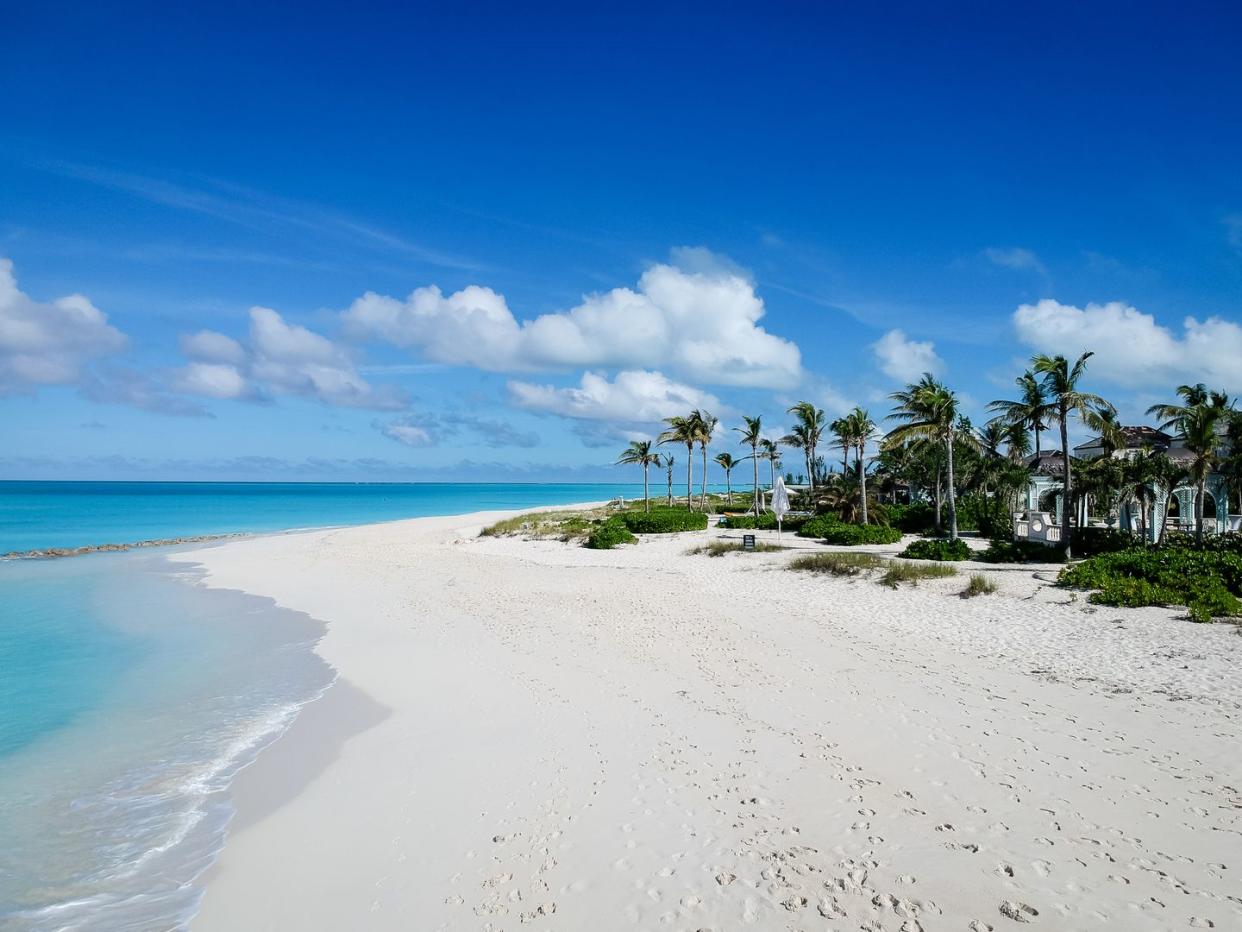 drone photo of pier in grace bay, providenciales, turks and caicos