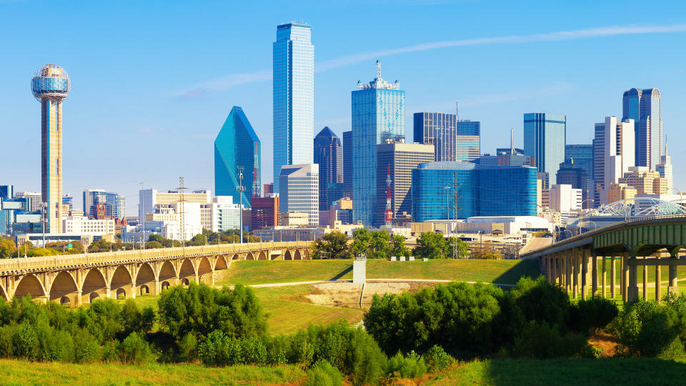 view of the skyline of Dallas financial district during a beautiful bright blue day.