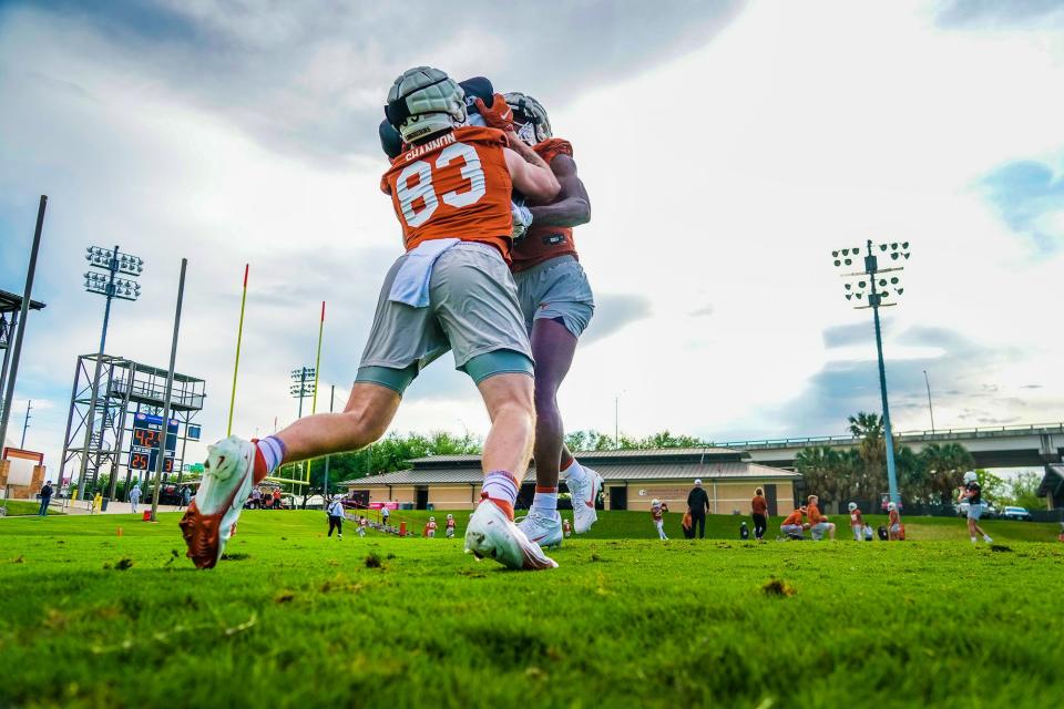 Texas tight ends Spencer Shannon, left, and Amari Niblack go through blocking drills during football practice at Denius Fields last week. The Longhorns had the pads on again Monday, which head coach Steve Sarkisian said gave him a better feel for the temperature of the team.