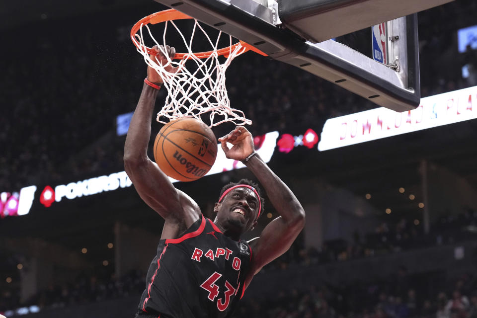 Toronto Raptors forward Pascal Siakam (43) scores against the Utah Jazz during second-half NBA basketball game action in Toronto, Saturday, Dec. 23, 2023. (Chris Young/The Canadian Press via AP)