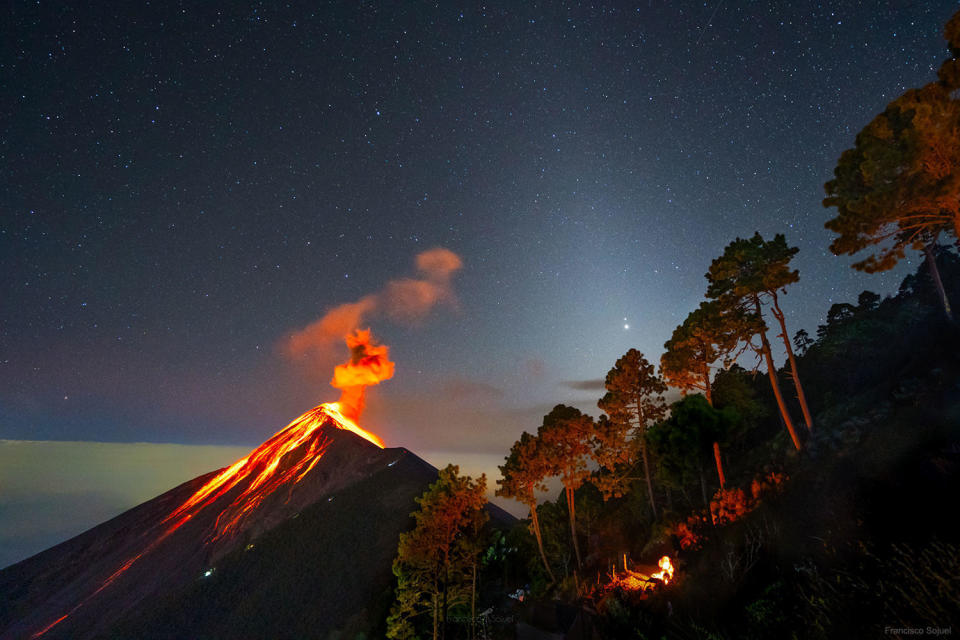 Jupiter and Saturn are visible ahead of the great conjunction, over an erupting volcano in Guatemala.  / Credit: Francisco Sojuel / NASA Astronomy Picture of the Day