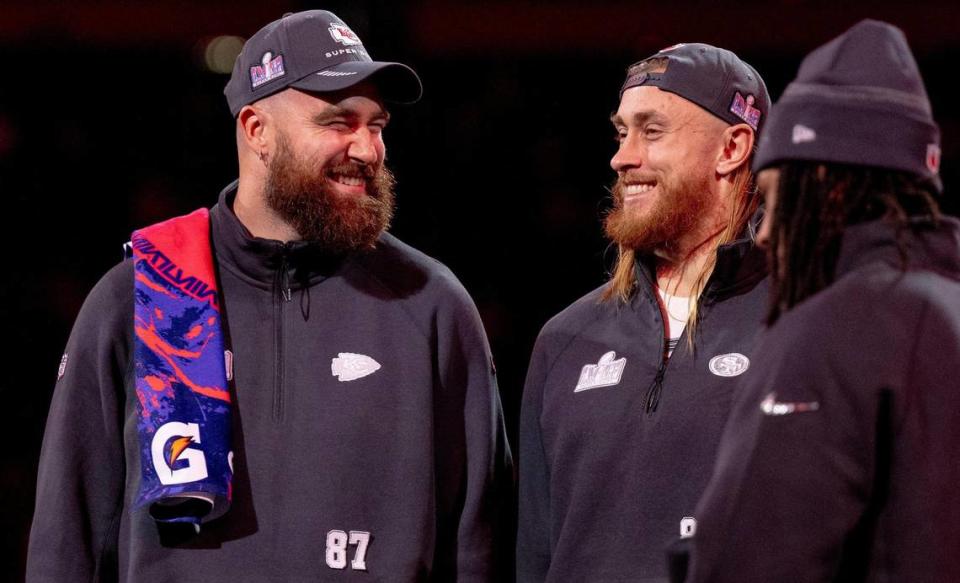 Kansas City Chiefs tight end Travis Kelce (87) laughs with San Francisco 49ers tight end George Kittle during Super Bowl LVIII’s Opening Night event at Allegiant Stadium on Monday, Feb. 5, 2024, in Las Vegas.