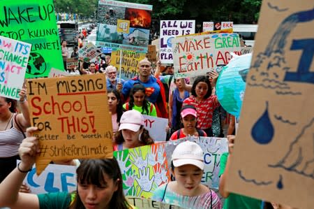 Environmental activists participate in a Global Climate Strike near the Ministry of Natural Resources and Environment office in Bangkok, Thailand