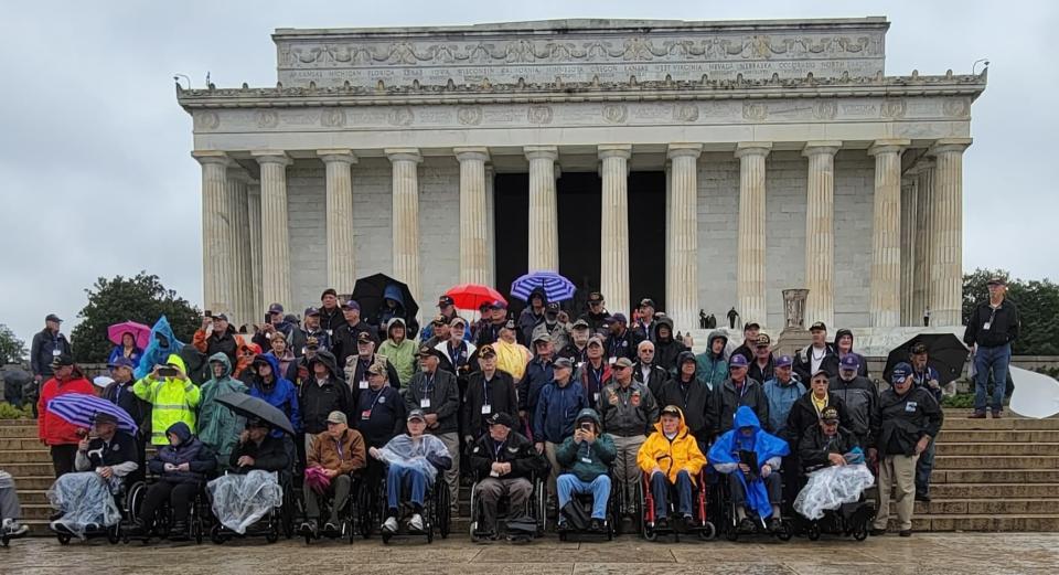 The veterans got together for a group photo in front of the Lincoln Memorial on Oct. 1 after arriving in Washington.