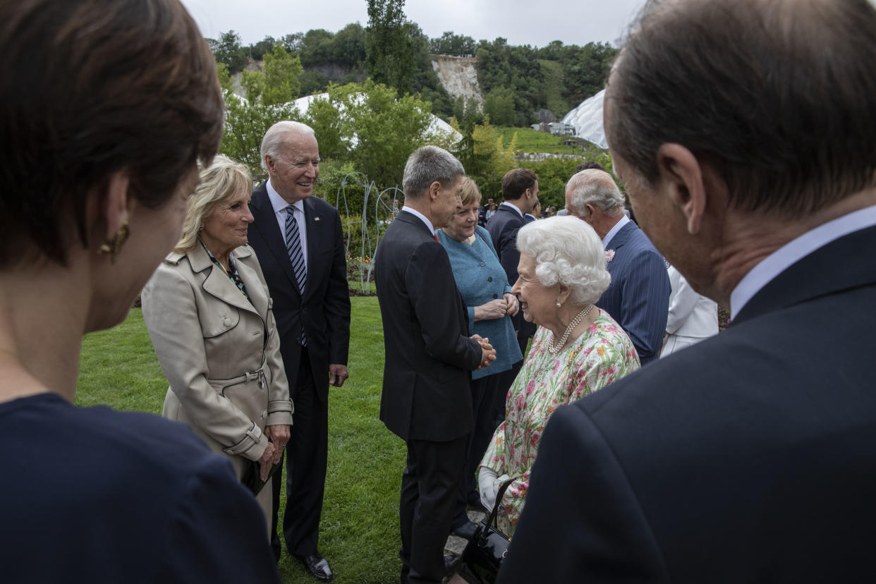 ST AUSTELL, ENGLAND - JUNE 11: United States President Joe Biden, First Lady Jill Biden and Queen Elizabeth II chat at a drinks reception for Queen Elizabeth II and G7 leaders at at The Eden Project during the G7 Summit on June 11, 2021 in St Austell, Cornwall, England. UK Prime Minister, Boris Johnson, hosts leaders from the USA, Japan, Germany, France, Italy and Canada at the G7 Summit. This year the UK has invited India, South Africa, and South Korea to attend the Leaders' Summit as guest countries as well as the EU. (Photo by Jack Hill - WPA Pool / Getty Images)
