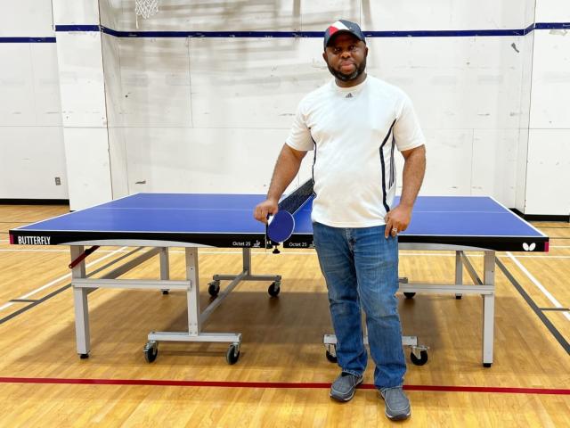 He just absolutely wiped the floor with me': Meet Fort Simpson's ping-pong  playing priest