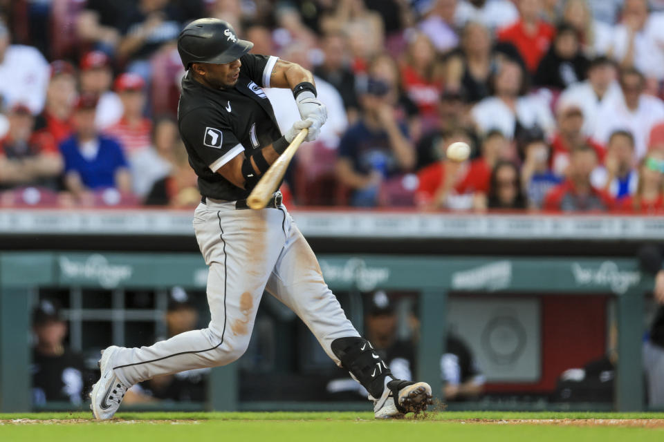 Chicago White Sox's Elvis Andrus hits an three-run home run during the fifth inning of a baseball game against the Cincinnati Reds in Cincinnati, Friday, May 5, 2023. (AP Photo/Aaron Doster)