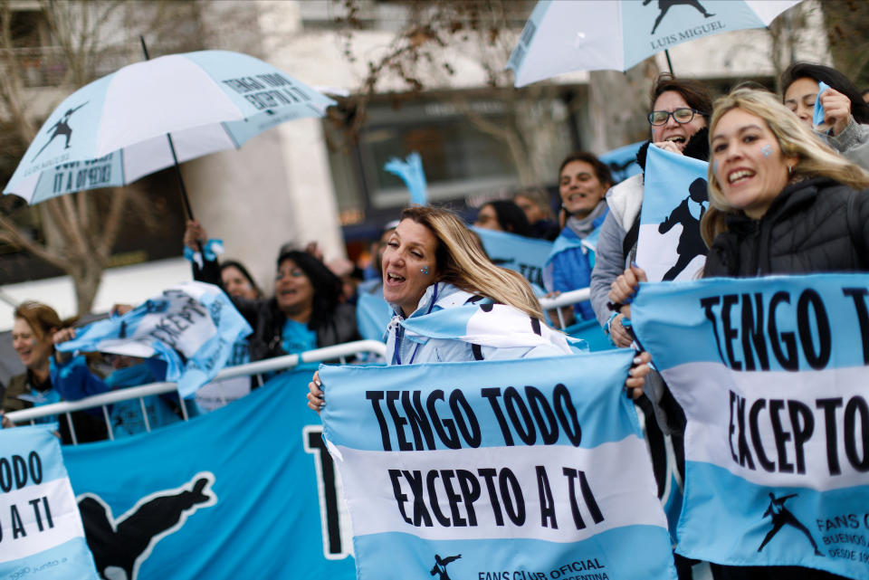 Members of Mexican singer Luis Miguel's fan club sing and dance before leaving in a joy train (a modified bus) to the stadium where the singer will perform tonight, in Buenos Aires, Argentina August 3, 2023. REUTERS/Agustin Marcarian