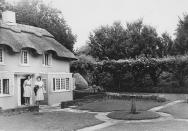 <p>This little thatched cottage was gifted to Queen Elizabeth on her 6th birthday by the people of Wales. Built two-fifths to scale, it contains a living room, kitchen, bedroom, and bathroom. Queen Elizabeth and Princess Margaret tended to it themselves, though now the royal children get the most use out of it. It currently sits on the grounds of the Royal Lodge.</p>